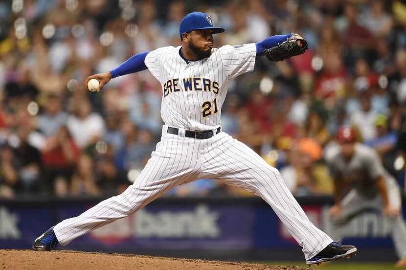 MILWAUKEE, WI - JULY 08:  Jeremy Jeffress #21 of the Milwaukee Brewers throws a pitch during...