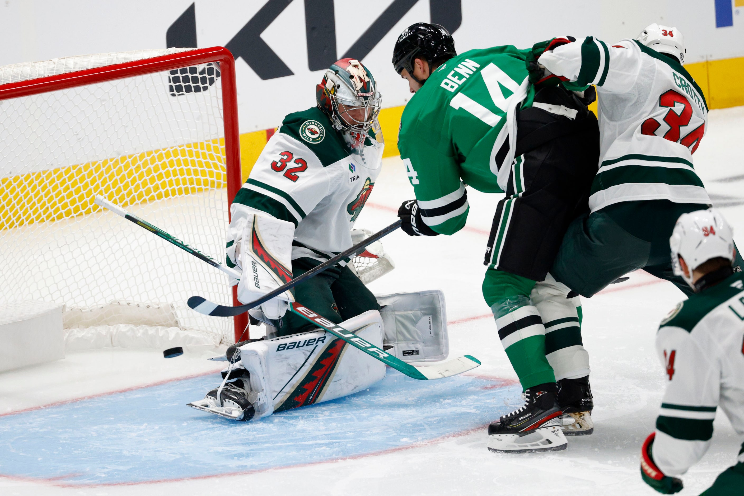 Dallas Stars left wing Jamie Benn (14) scores a goal against Minnesota Wild goaltender Filip...