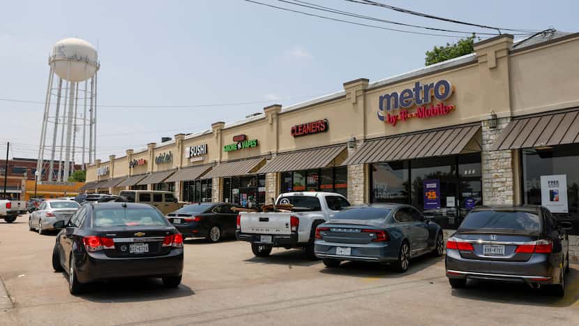 A shopping center pictured along McDonald Street on Wednesday, May 24, 2023, in McKinney,...