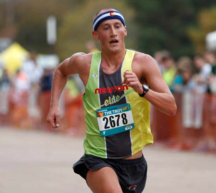 Tyler McCandless wins second place in the men's 8-mile run at the Dallas YMCA Turkey Trot in...