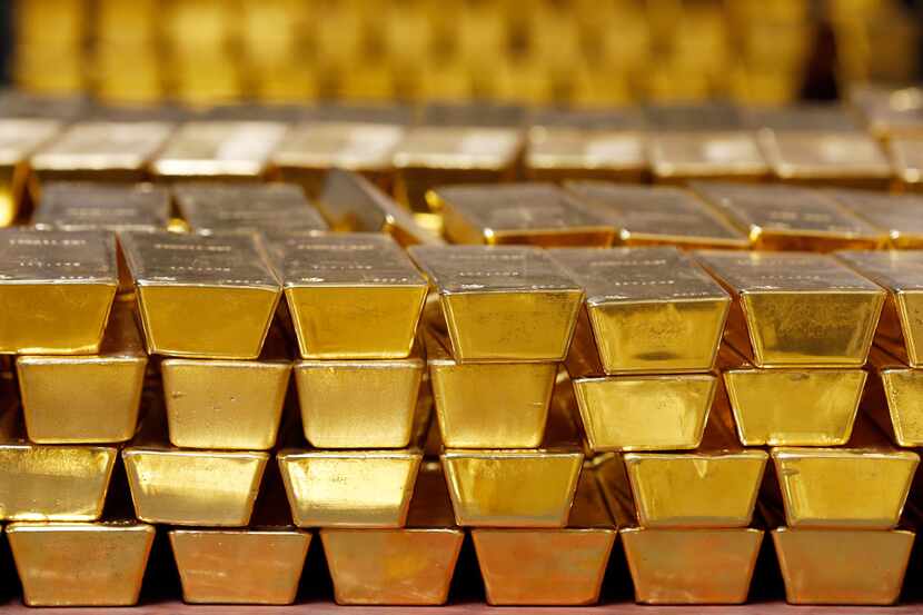 Gold bars stacked in a vault. (AP Photo/File)