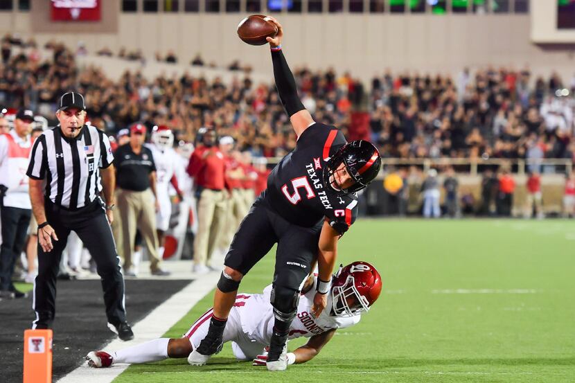 LUBBOCK, TX - OCTOBER 22: Patrick Mahomes II #5 of the Texas Tech Red Raiders reaches for...