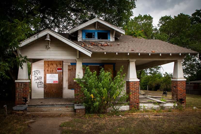 This house at 1107 E. 11th St. in the Tenth Street Historic District will be razed before...