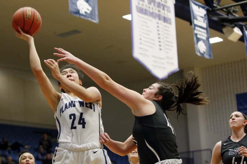 Plano West senior forward Natalie Chou (24) leaps for a layup while defended by Flower Mound...