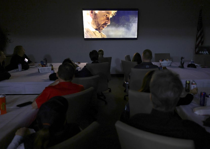 Real-life landmen and their families gather to watch "Landman" at the AAPL offices in Fort...