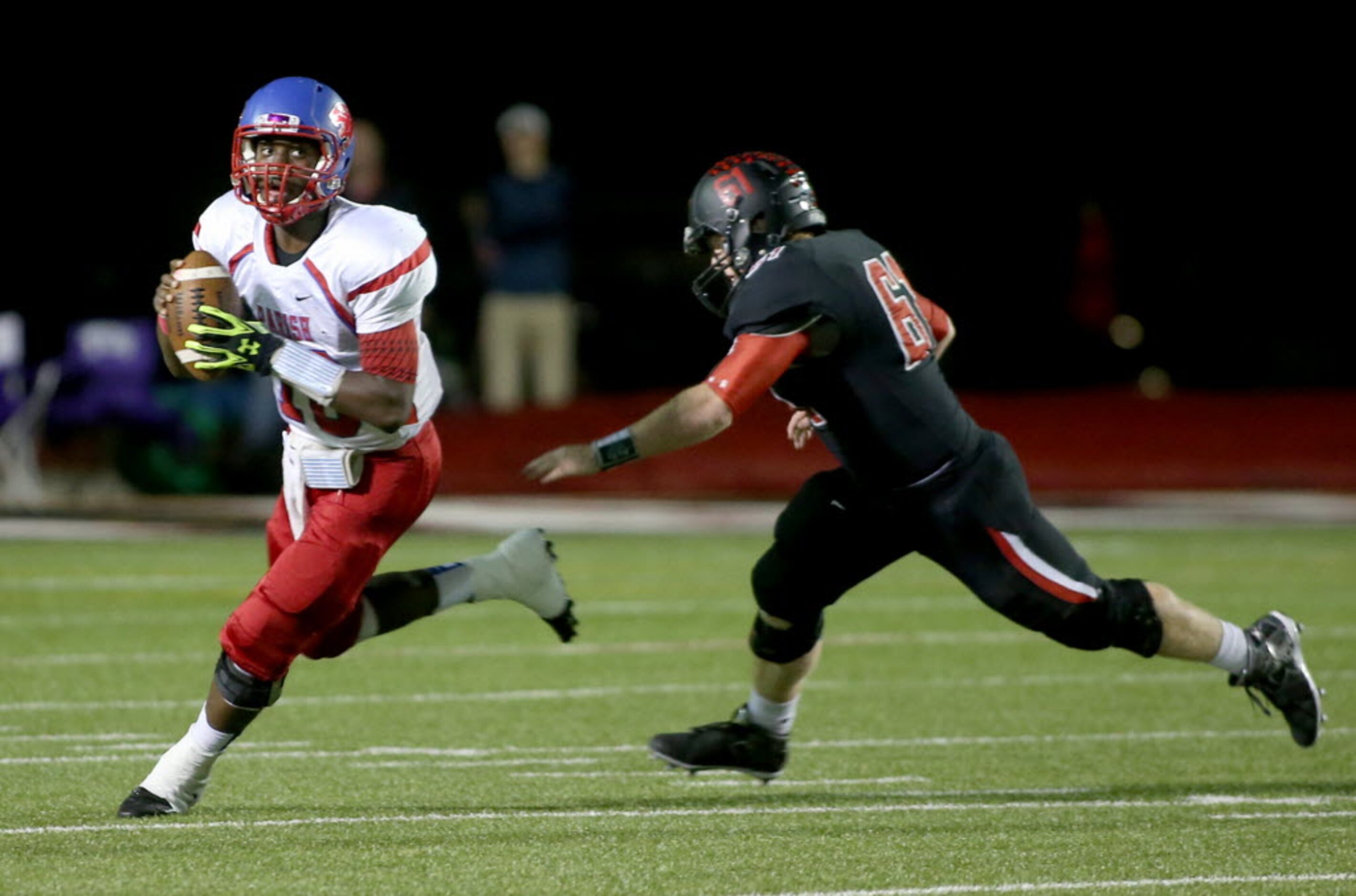 Parish Episcopal’s Jeremy Hodge (10) is pressured by Fort Worth Christian’s Beau Robinson...