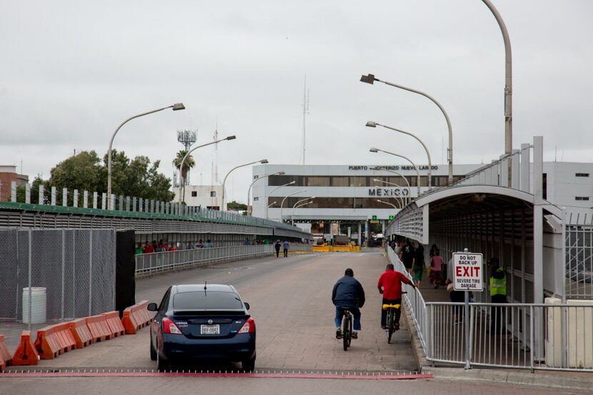 People cross the border in Laredo, Texas, to Nuevo Laredo, Tamaulipas. 