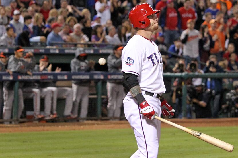 Texas left fielder Josh Hamilton is pictured after striking out to end the eighth inning in...