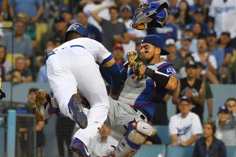 LOS ANGELES, CA - JUNE 13:  Matt Kemp #27 of the Los Angeles Dodgers is out at the plate as...