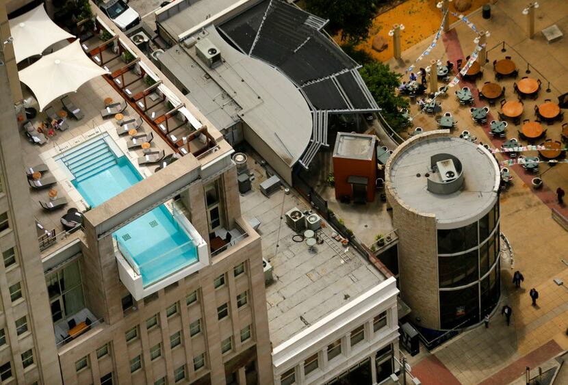 The Joule Hotel and it's protruding, glass-fronted swimming pool are seen from the Tower...