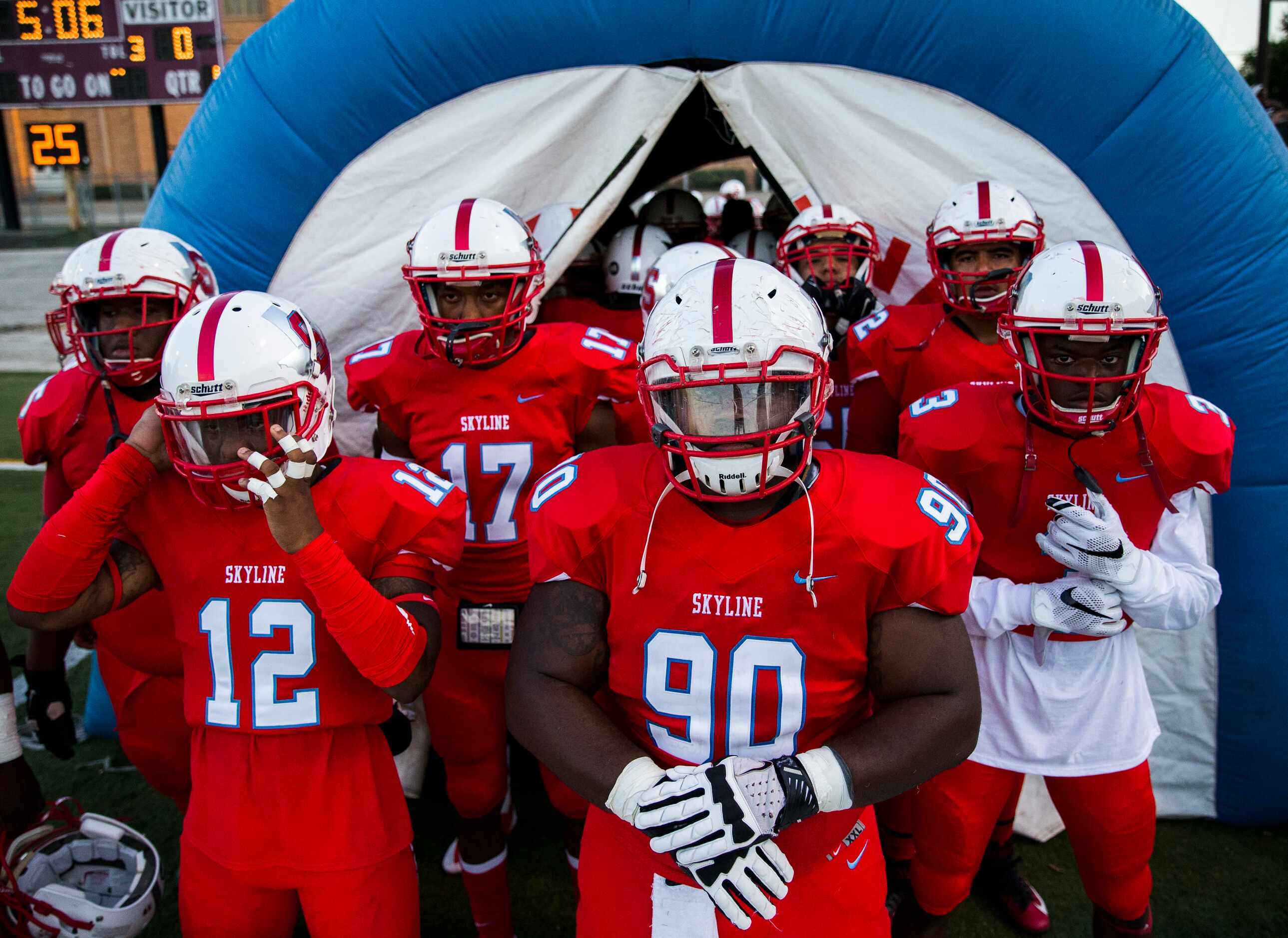 Skyline football players get ready to enter the field before  their game against the...