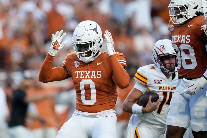 Texas linebacker Anthony Hill Jr. (0) celebrates after sacking Louisiana-Monroe quarterback...