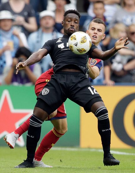 Sporting Kansas City forward Gerso (12) controls the ball in front of Real Salt Lake forward...