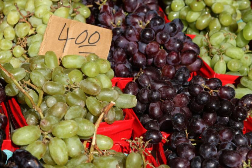 Grapes from California are displayed for sale by Little John's Farm in Emory, Tx at the...