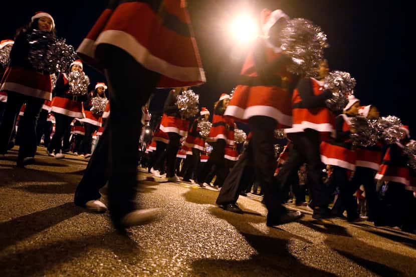The Duncanville High School drill team performed in the annual Christmas parade in...