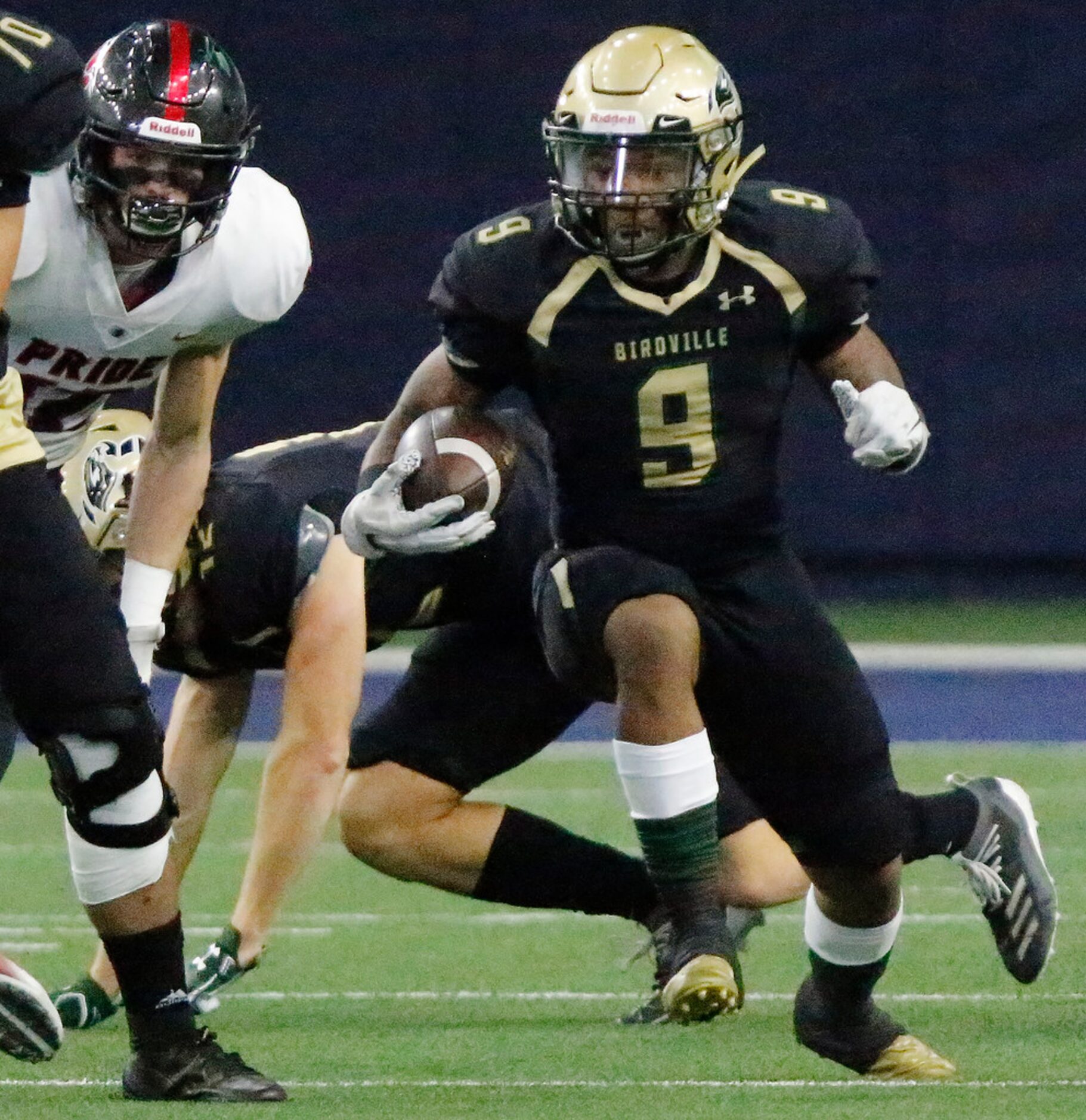 Birdville High School running back Laderrious Mixon (9) carries the football during the...