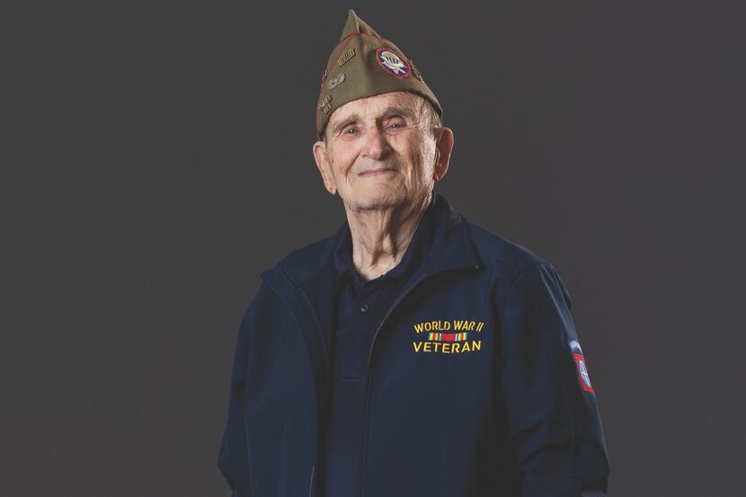 A photo of Clifford Stump wearing a hat from his Army uniform and a World War II veteran...