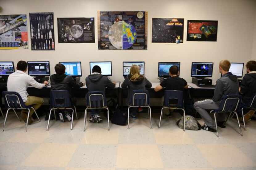 
Students work on their project to develop an educational computer game to teach...