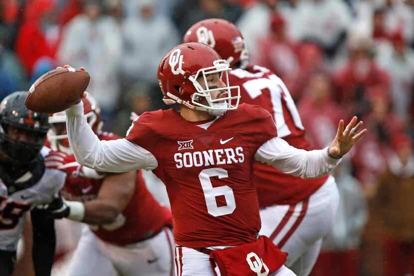 NORMAN, OK - DECEMBER 3: Quarterback Baker Mayfield #6 of the Oklahoma Sooners looks to...