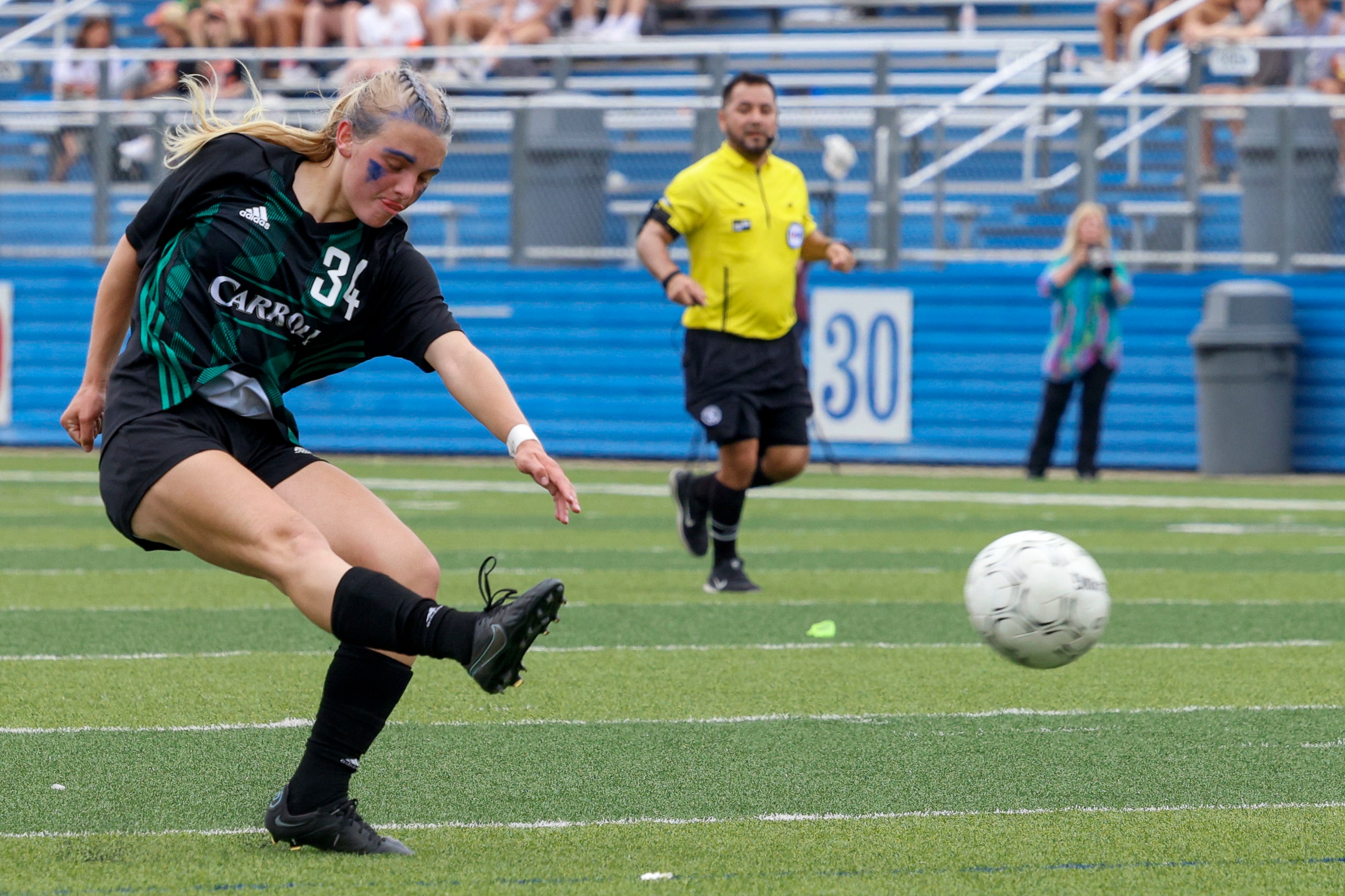 Southlake Carroll midfielder Hannah Jordan (34) takes a shot during the first half of a...