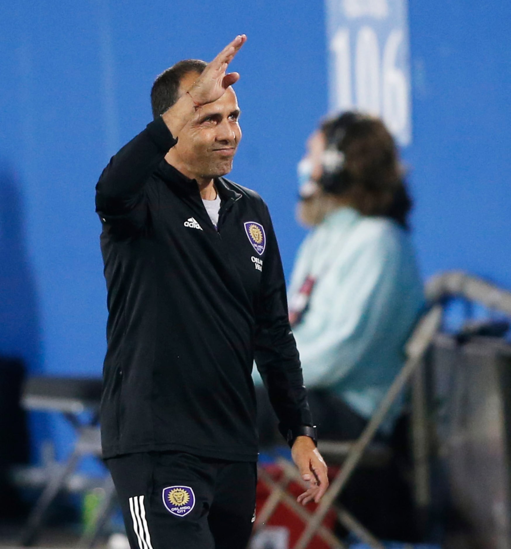 Orlando City head coach Oscar Pareja waves to the crowd before playing FC Dallas at Toyota...