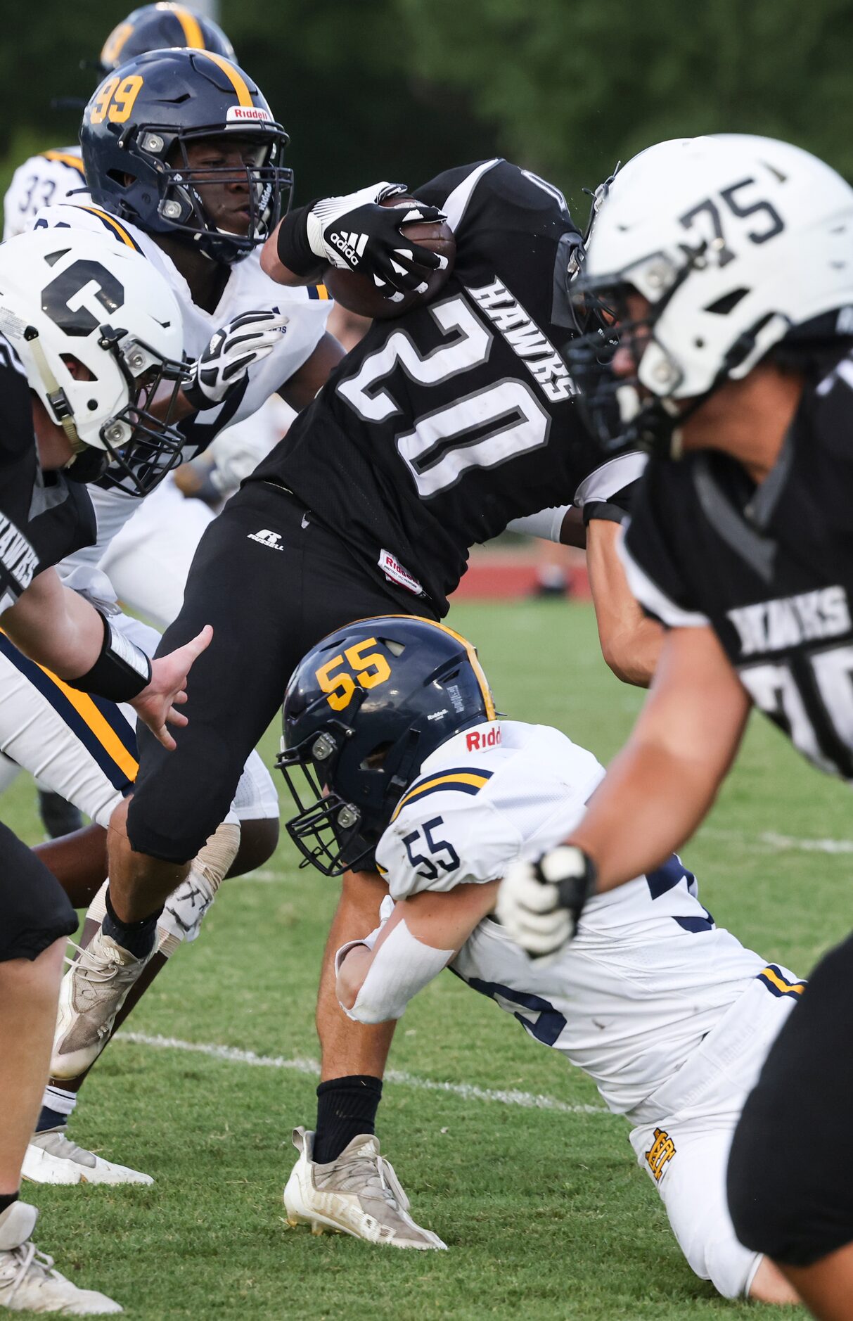 Cistercian Preparatory School, Michael Peterman (20)  gets stoped by St. Mark's School of...