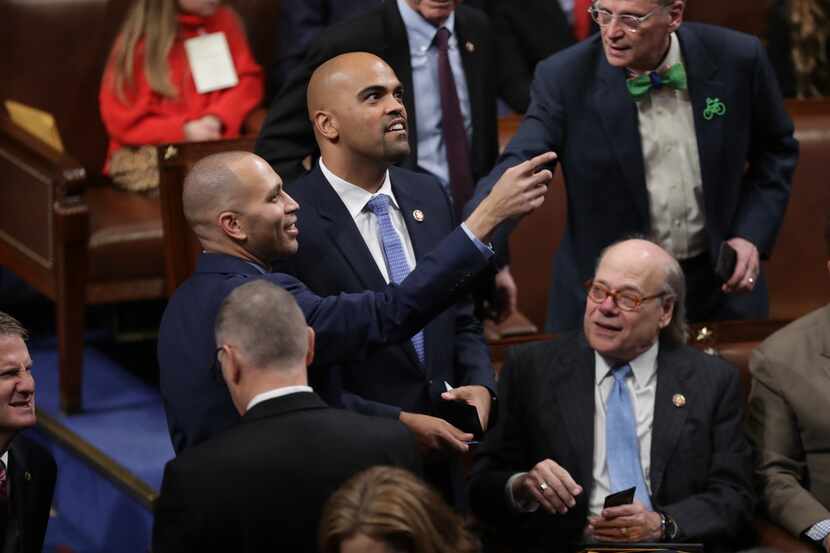 U.S. Rep Colin Allred registers as present with help from U.S. Rep. Hakeem Jeffries...