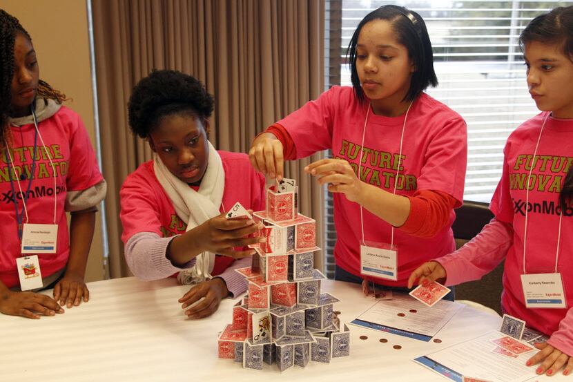 Aminia Randolph, Cecelia Kalu, Leilana Azalia Davis, and Kimberly Resendez, try to make the...