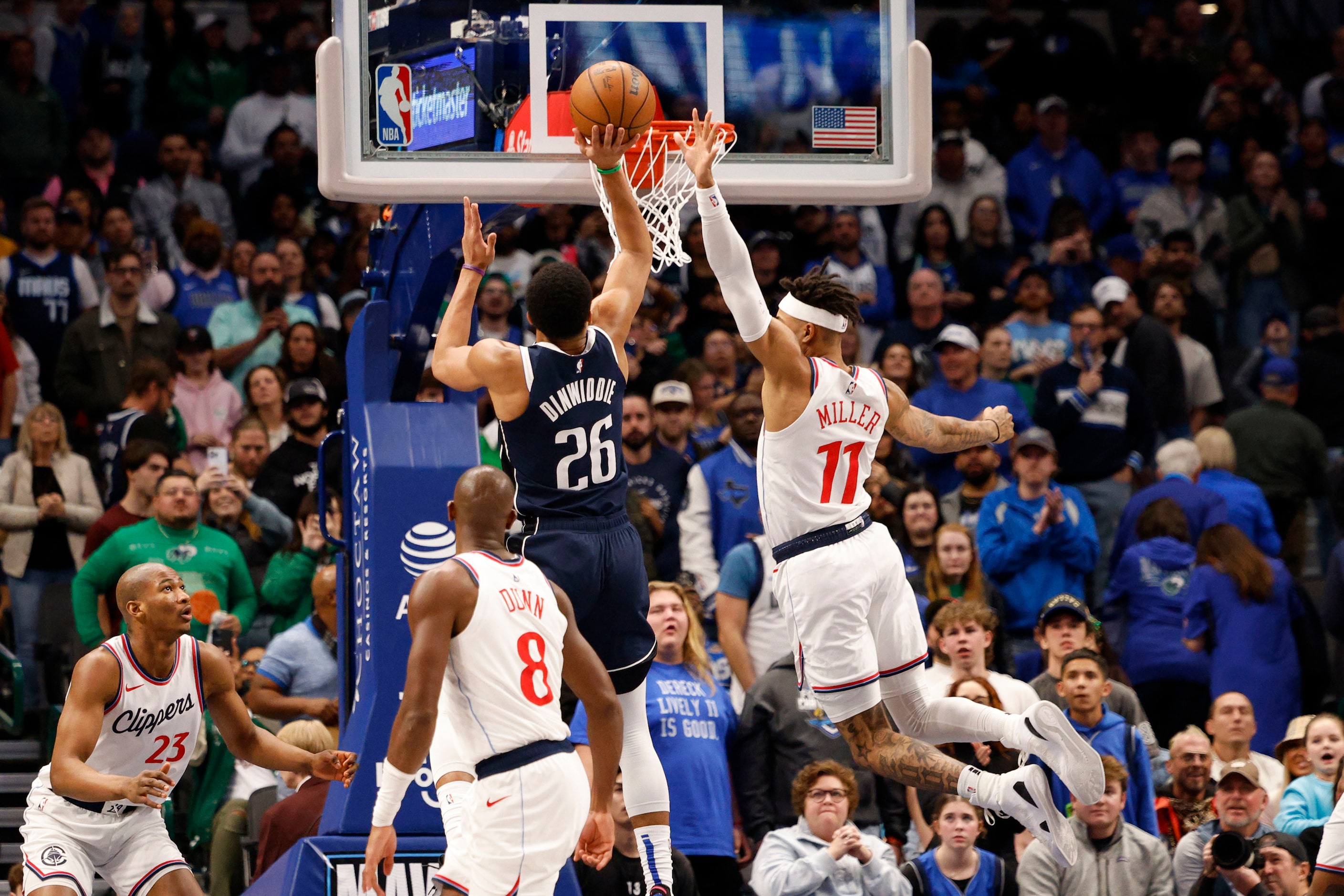 Dallas Mavericks guard Spencer Dinwiddie (26) attempts a jump shot against LA Clippers guard...