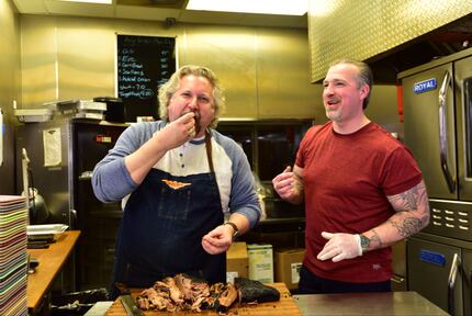 Slow Bone owner Jack Perkins (left) taught a Brooklyn barbecue guy Shannon Ambrosio how we...