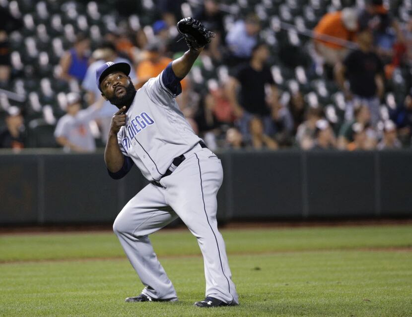San Diego Padres relief pitcher Fernando Rodney gestures after closing out the team's...