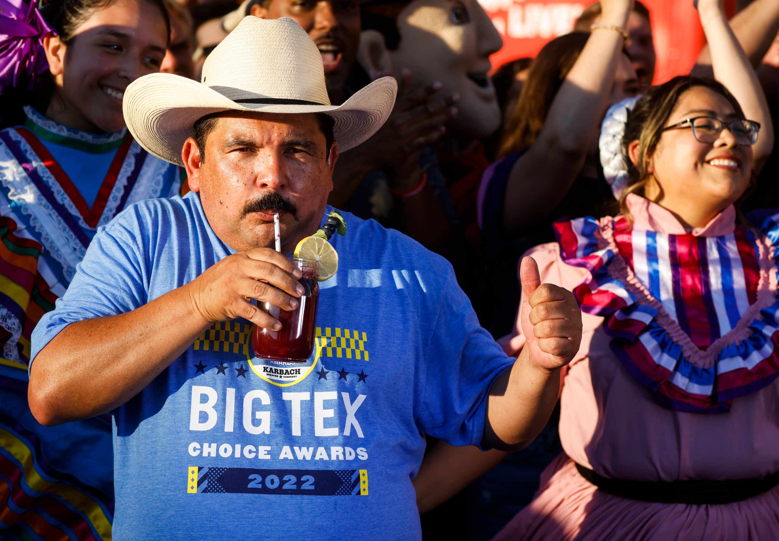 Guillermo Rodriguez, reacts towards the camera as he the tries La Bluebonnet, one of the Big...