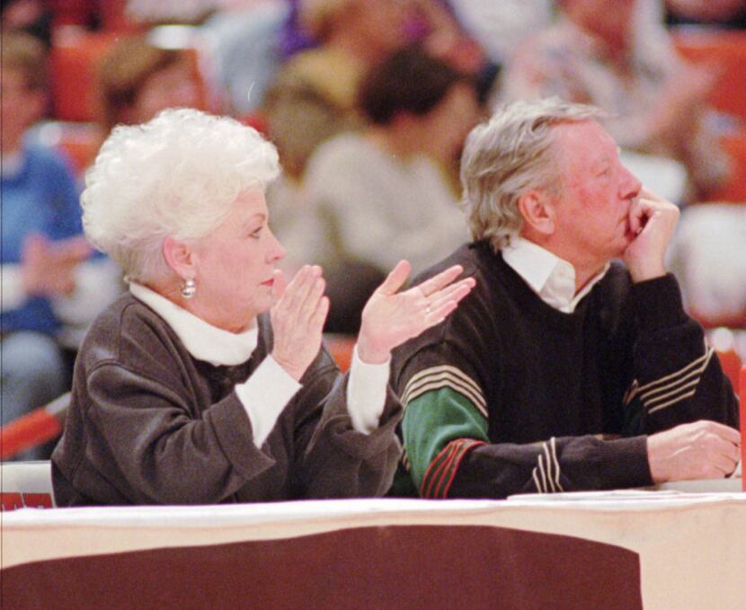 Former Texas Gov. Ann Richards watches a University of Texas women's basektball game with...