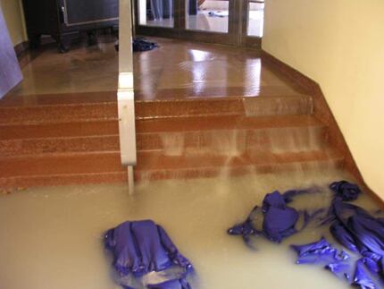 Flooding earlier this year in the Hall of State building at Fair Park.