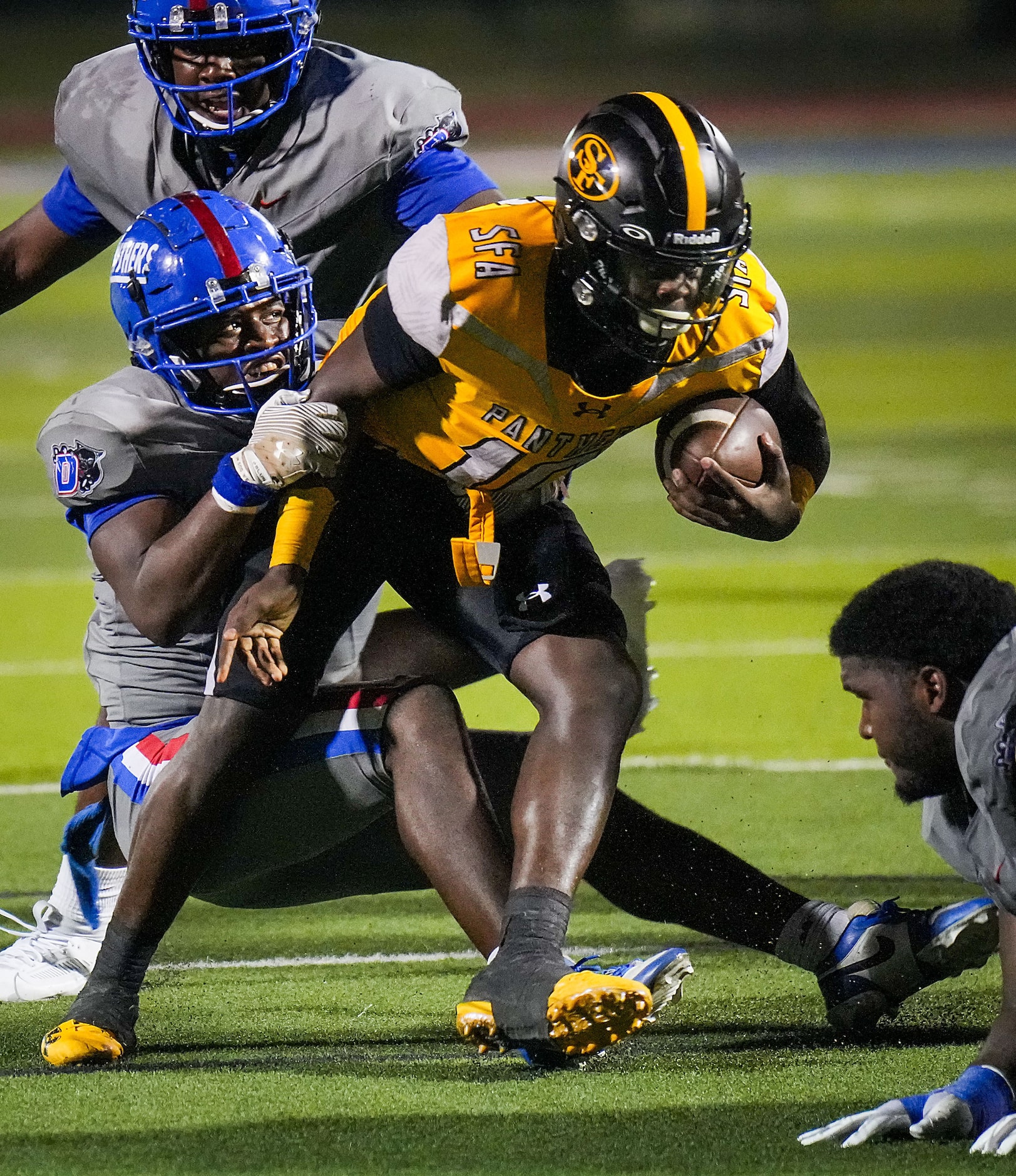 Duncanville linebacker Nehemiah Borner (4) sacks St. Frances Academy quarterback Jaylin...