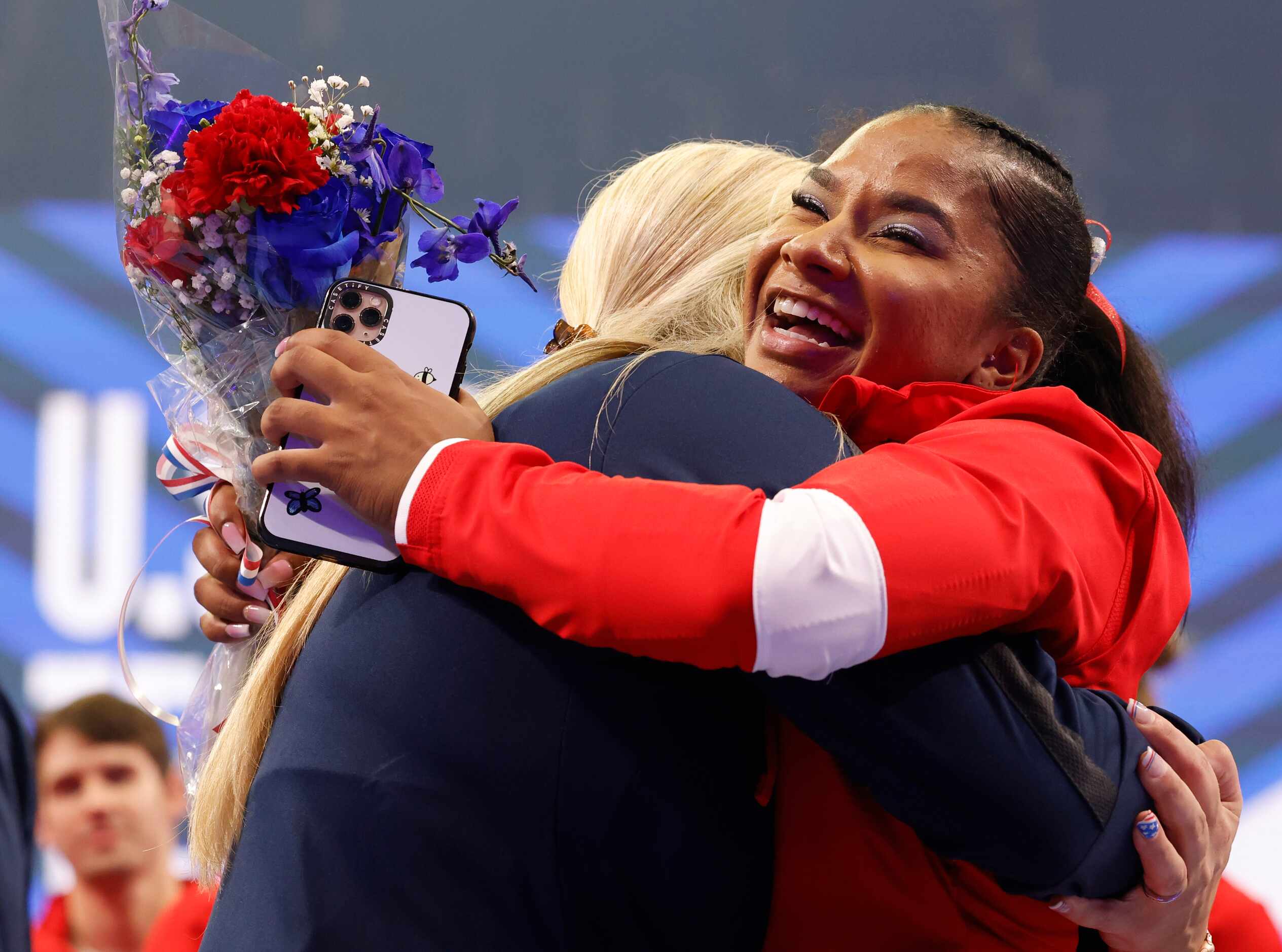 Jordan Chiles hugs her coach Cecile Landi after the women's U.S. Olympic gymnastics team was...