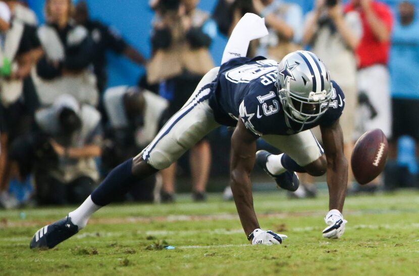 Cowboys wide receiver Michael Gallup (13) misses a pass during a game against the Carolina...