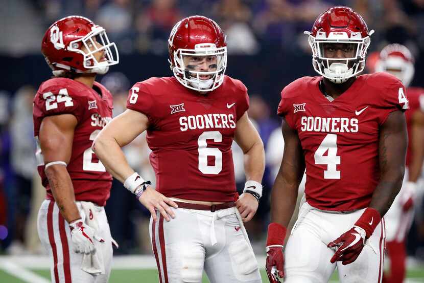 Oklahoma Sooners quarterback Baker Mayfield (6) waits for the play clock to wind down in the...