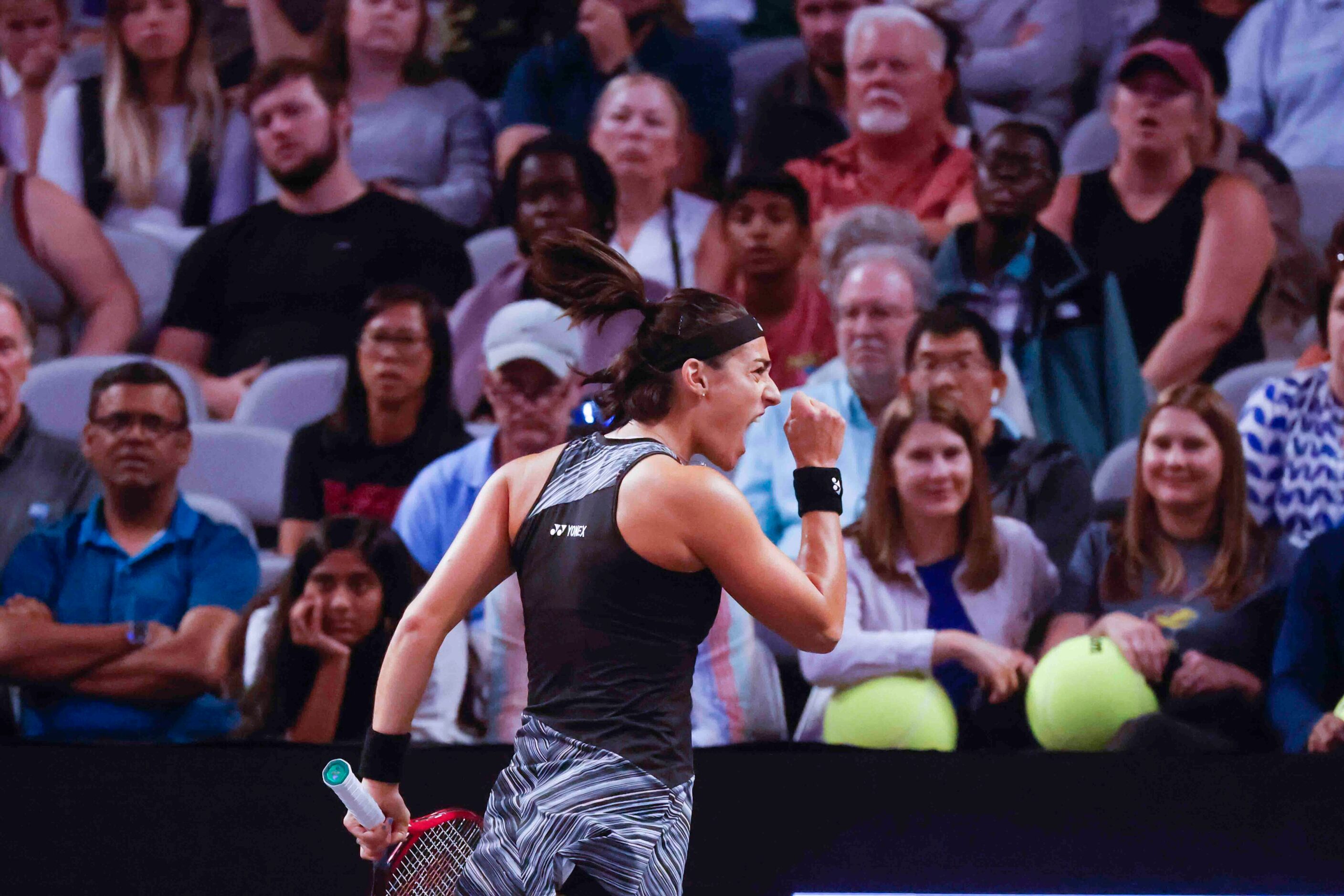 Caroline Garcia of France reacts after winning the second set against Coco Gauff of the USA...