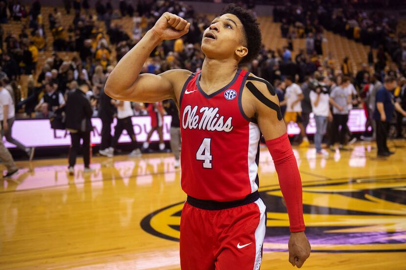 Mississippi's Breein Tyree celebrates as he walks off the court after defeating Missouri...
