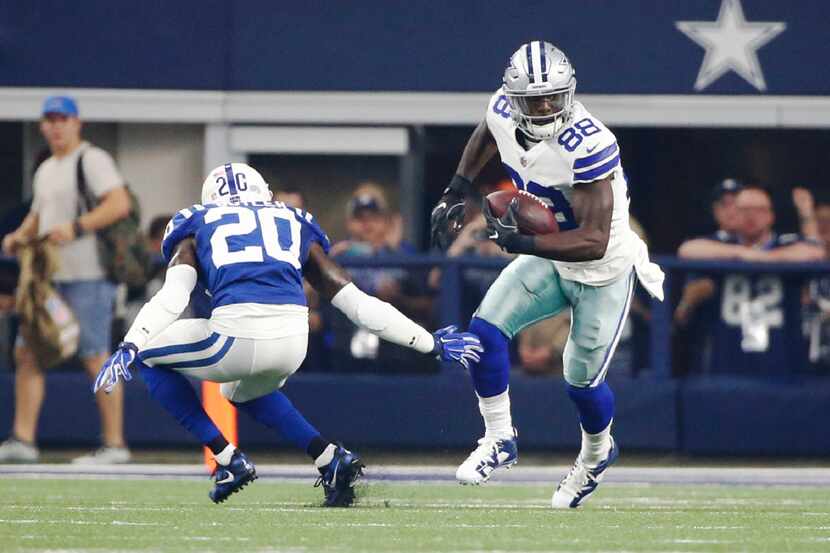 Dallas Cowboys wide receiver Dez Bryant (88) breaks away from Indianapolis Colts free safety...