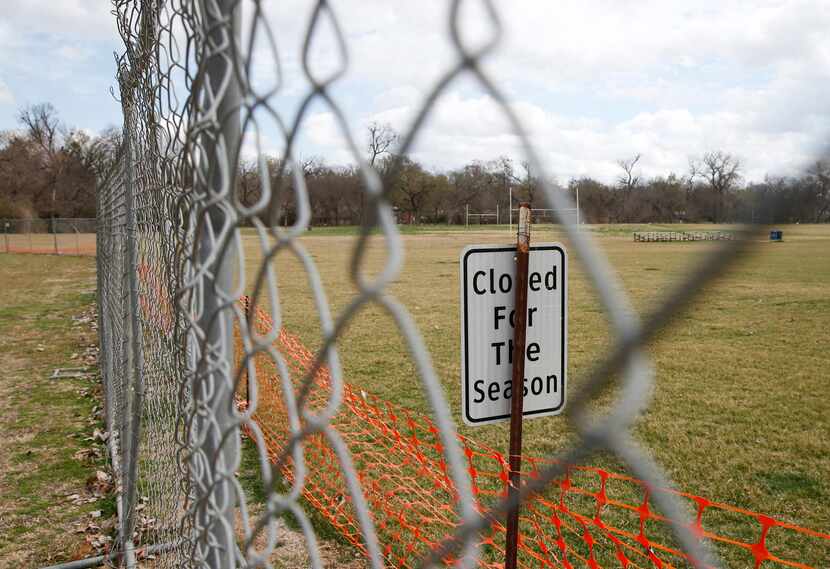 A sign on display is seen through a section of fencing installed for eagle preservation at...