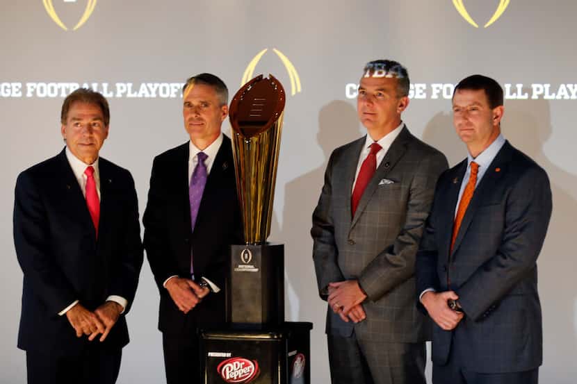 College football coaches from left to right; Nick Saban of Alabama, Chris Petersen of...