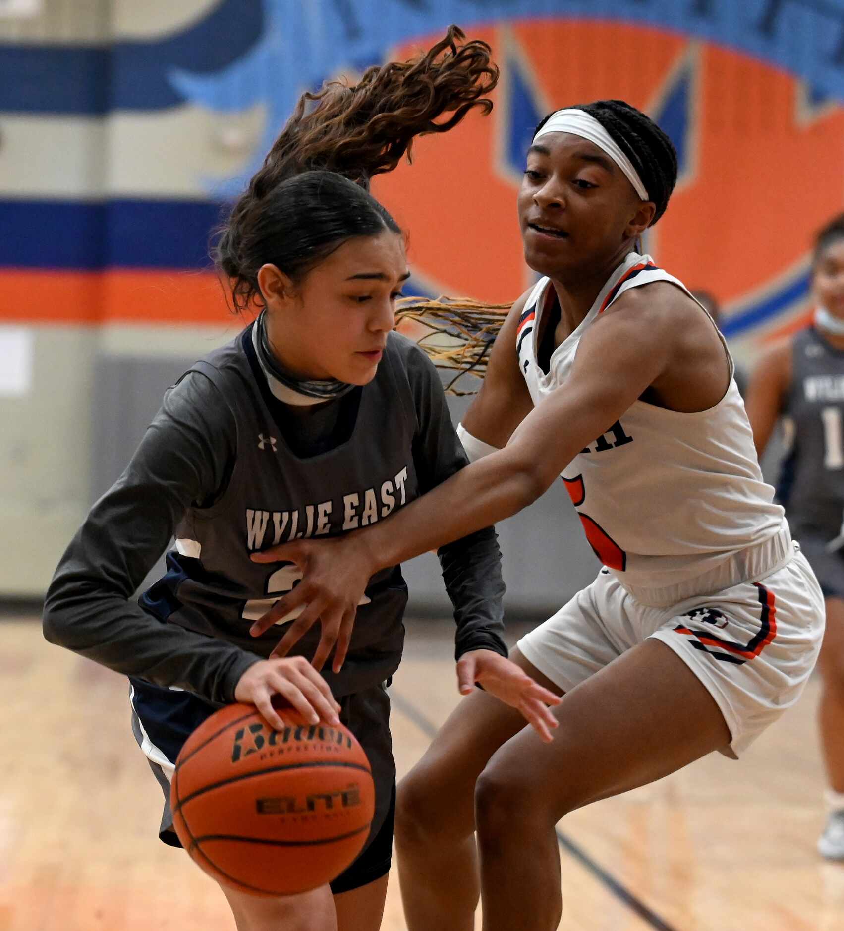 Wylie East’s Aaliyah Halstied protects the ball from McKinney North’s Yarnia Evans in the...