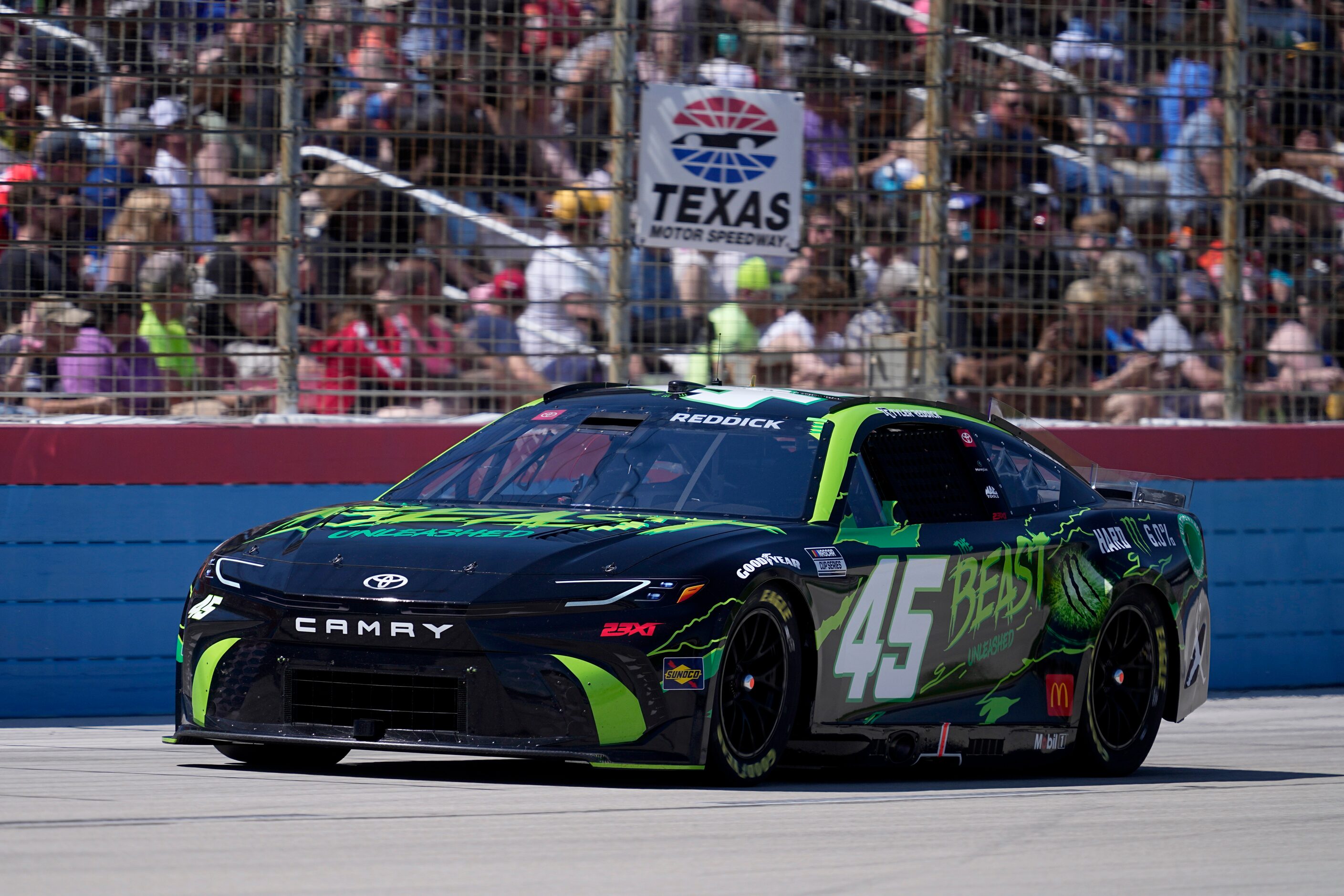 Tyler Reddick heads into Turn 1 during a NASCAR Cup Series auto race at Texas Motor Speedway...