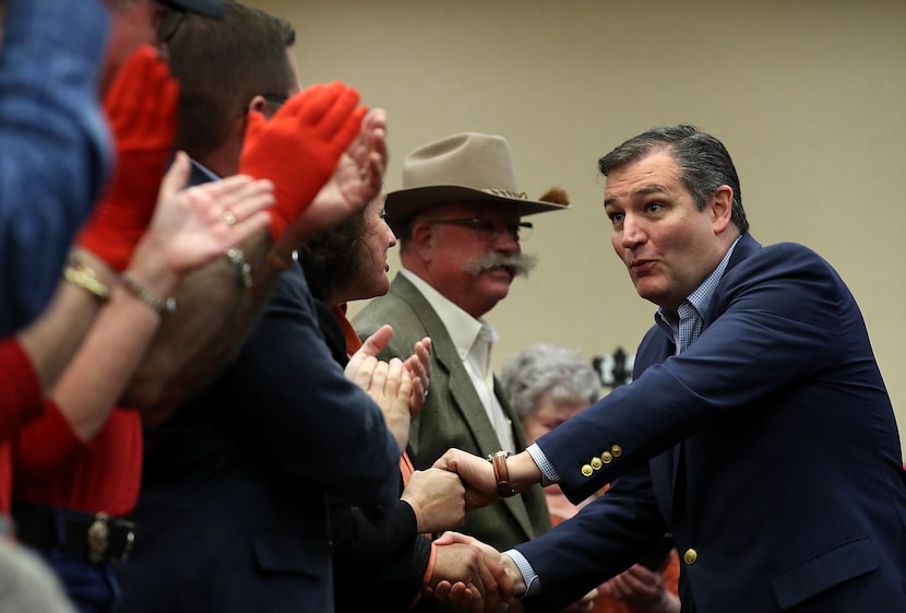 U.S. Sen. Ted Cruz (R-TX) greets supporters during a Get Out The Vote Bus Tour rally on...