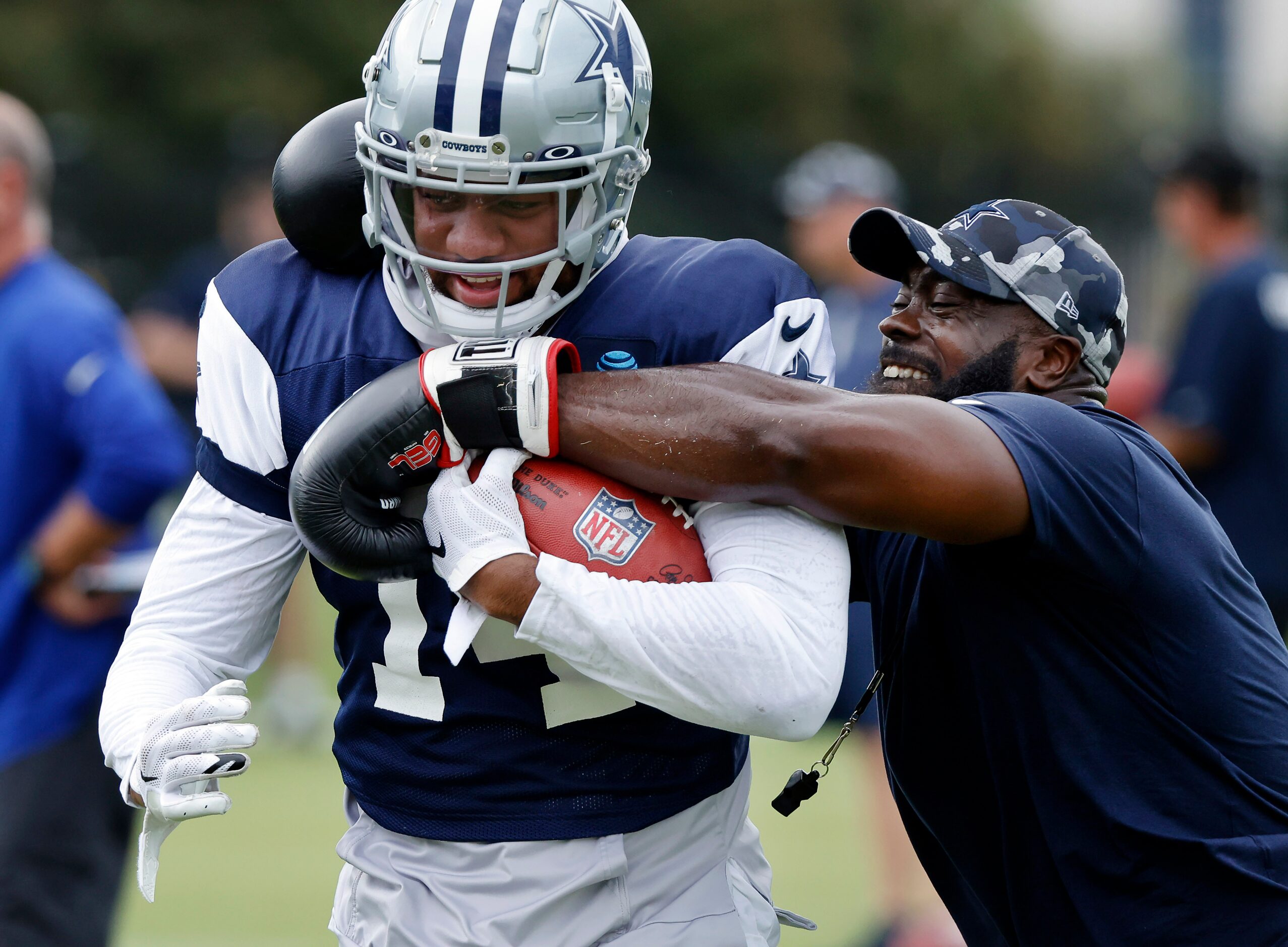 With his boxing gloves, Dallas Cowboys assistant strength and conditioning coach Kendall...