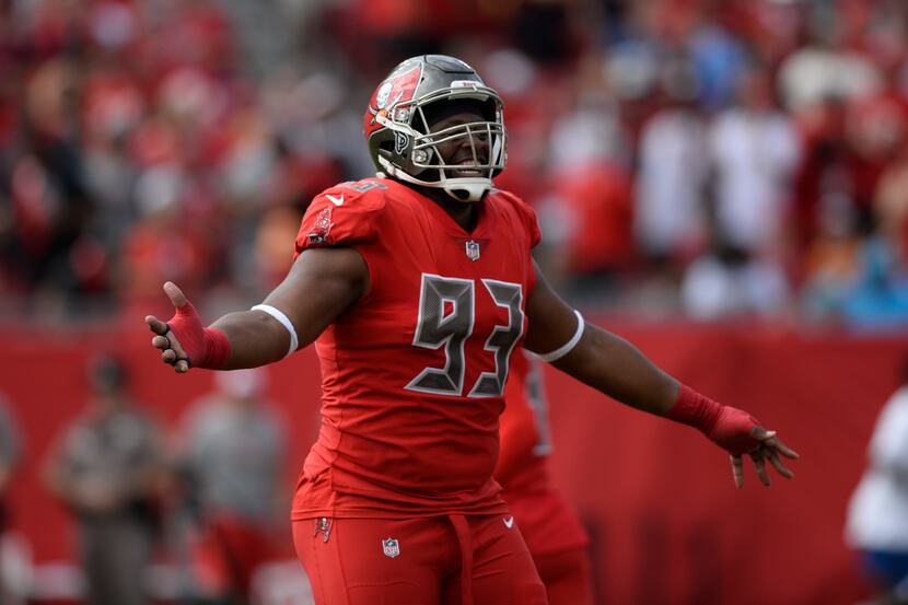 Tampa Bay Buccaneers defensive tackle Gerald McCoy (93) celebrates an interception by...