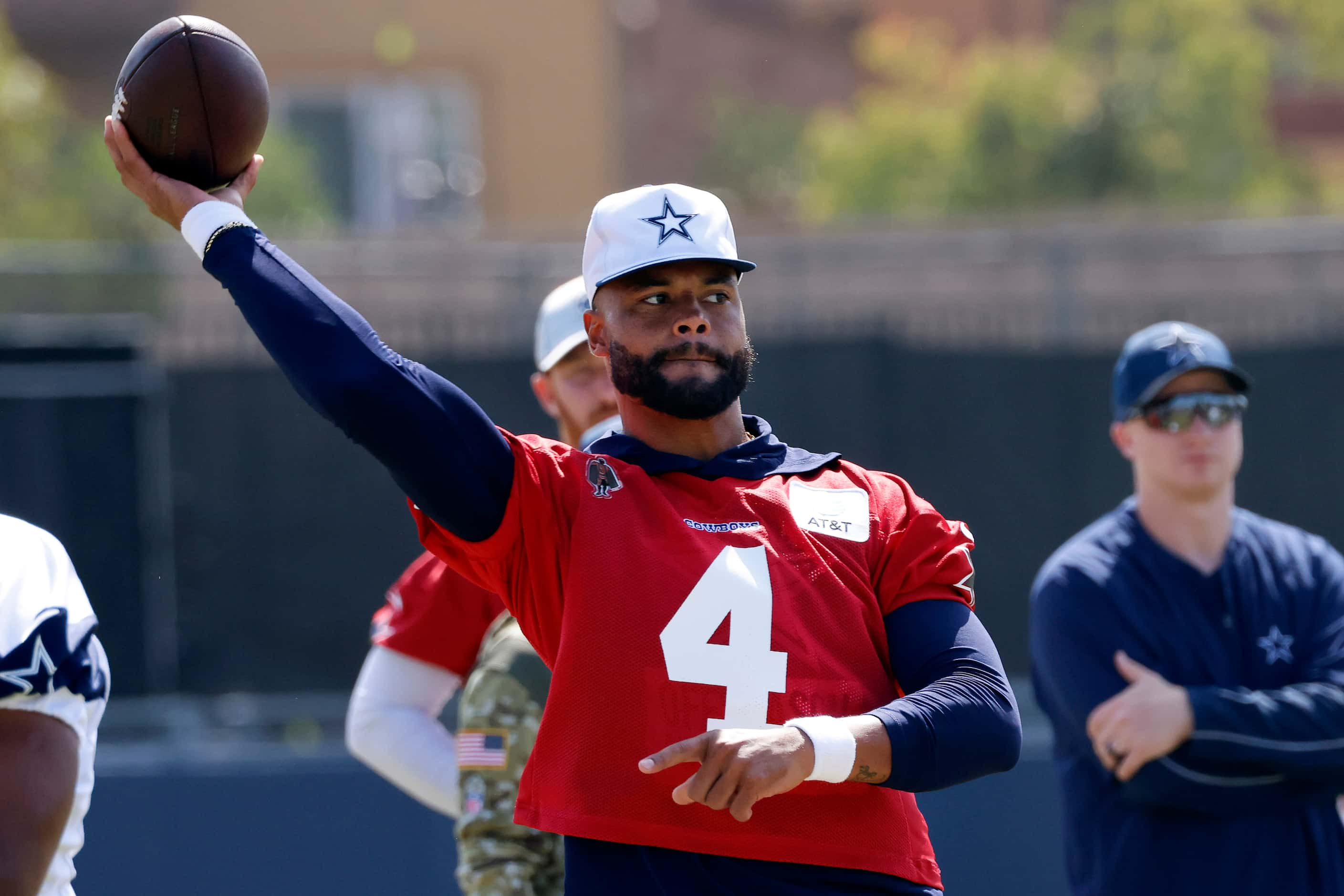 Dallas Cowboys quarterback Dak Prescott (4) tosses a pass during a mock game walk thru at...