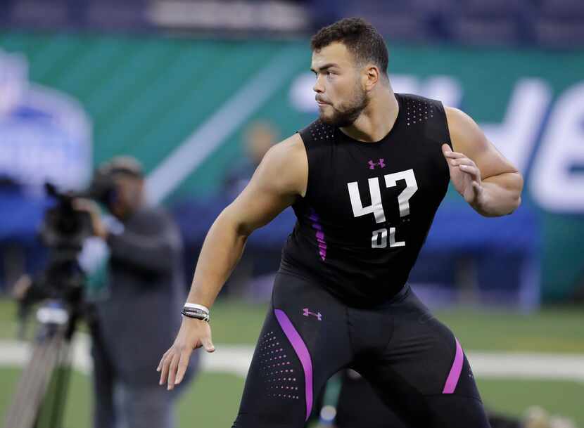 Texas offensive lineman Connor Williams runs a drill during the NFL football scouting...